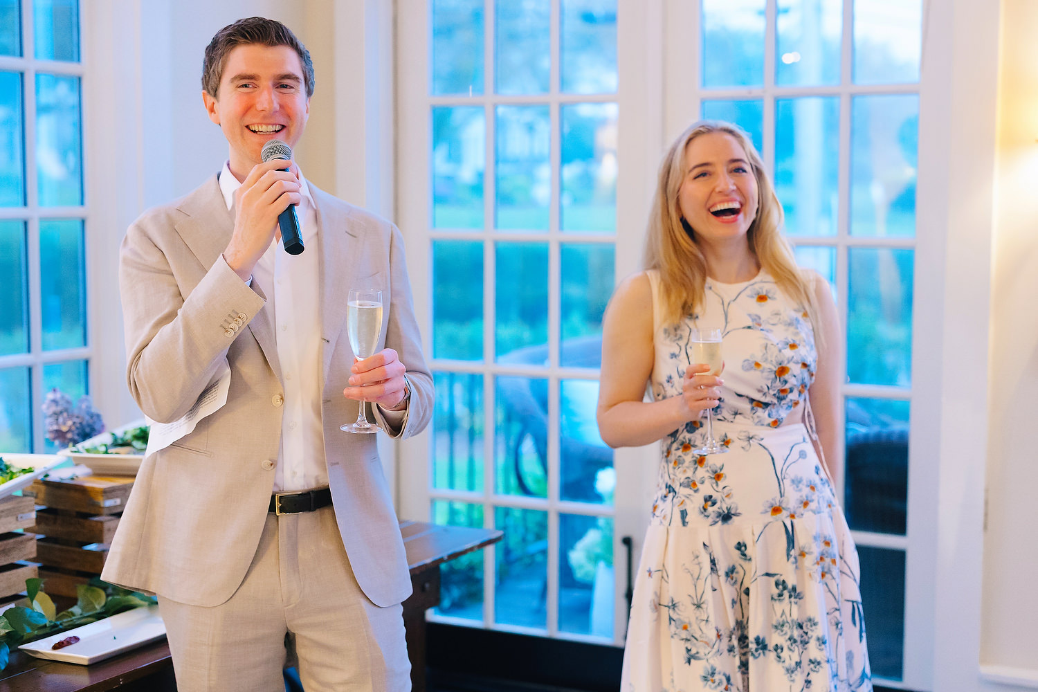 Diana and Luke greeting guests in fog during welcome party at Chatham Bars Inn