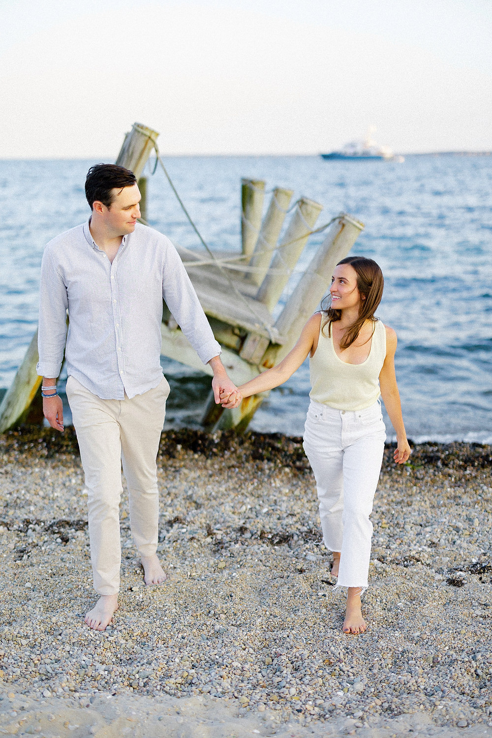 Candid moment captured by Alex Gordias Photography during Cape Cod engagement shoot