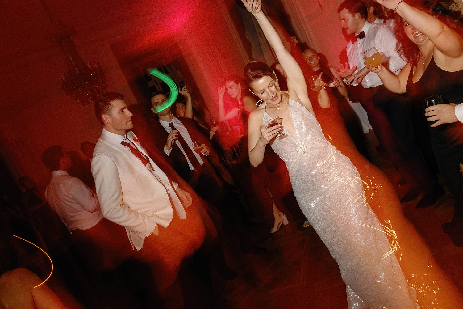 Reception dancing inside Glen Manor House under warm evening lights
